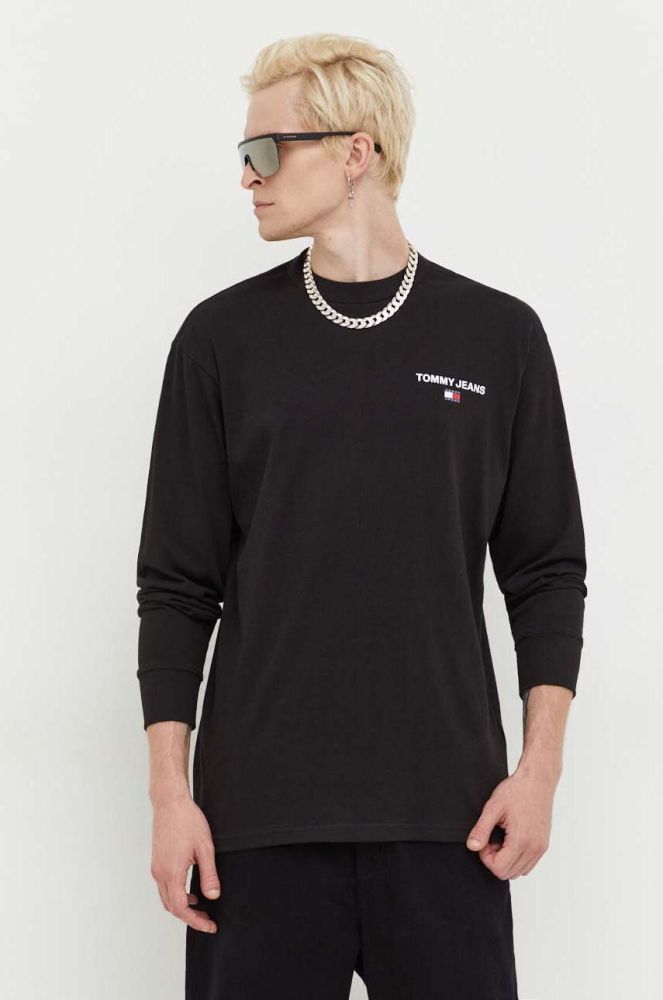 Бавовняний лонгслів Tommy Jeans колір чорний однотонний (3559514)