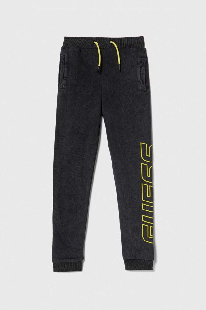 Дитячі бавовняні штани Guess колір сірий з принтом