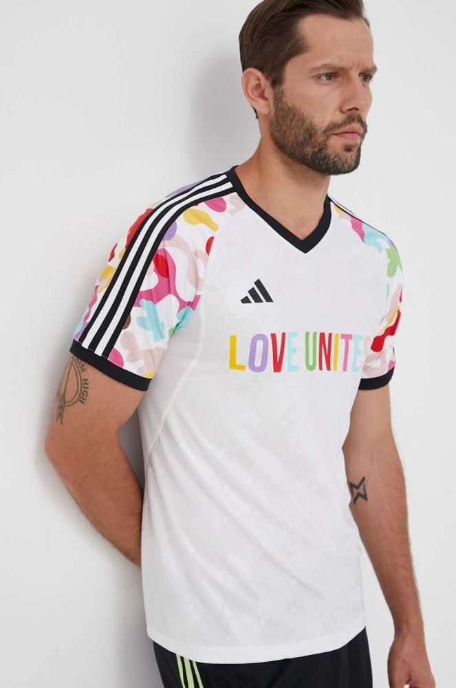 Тренувальна футболка adidas Performance Pride Tiro колір білий візерунок