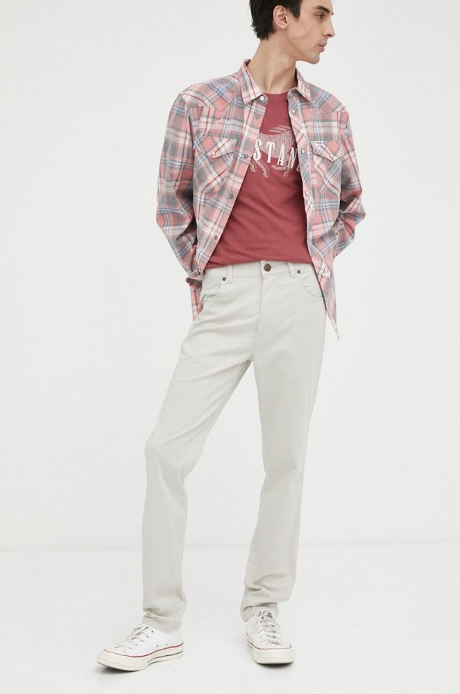 Штани Wrangler Larston чоловічі колір бежевий облягаюче